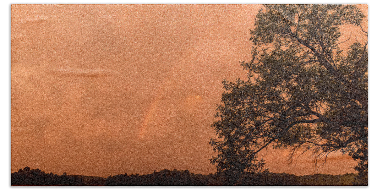 Orange Dawn Bath Towel featuring the photograph Strange orange sunrise with rainbow by Gary Eason