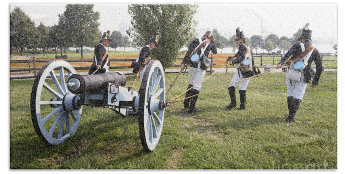 Baltimore Hand Towel featuring the photograph Wheeling the Cannon at Fort McHenry in Baltimore Maryland by William Kuta