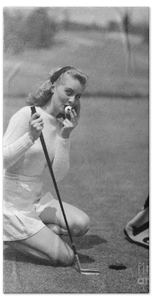 18th Bath Towel featuring the photograph Woman Kissing Golf Ball, C.1950s by Debrocke/ClassicStock