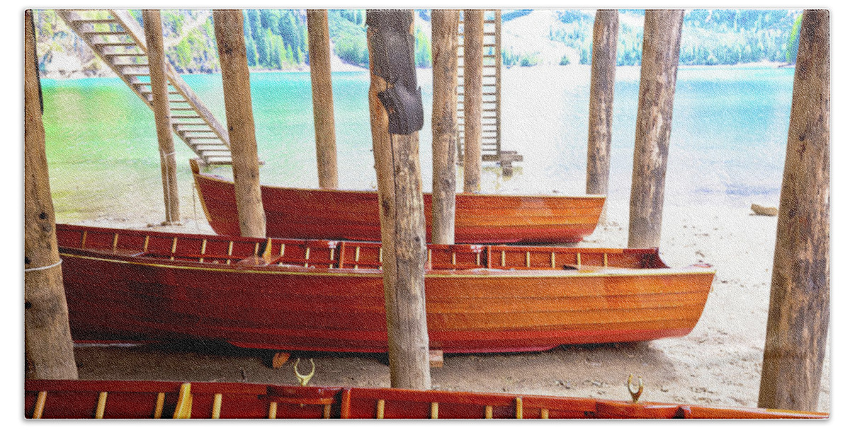 Prags Bath Towel featuring the photograph Wooden boats under boat house on Braies lake by Brch Photography