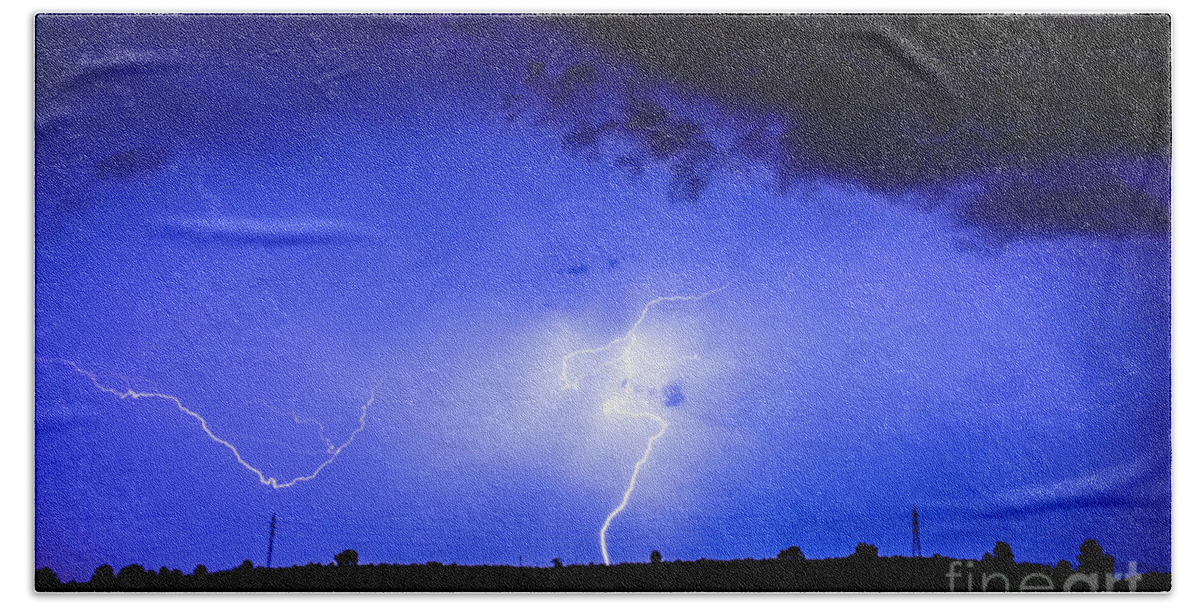 Background Hand Towel featuring the photograph Rays in a night storm with light and clouds. #3 by Joaquin Corbalan