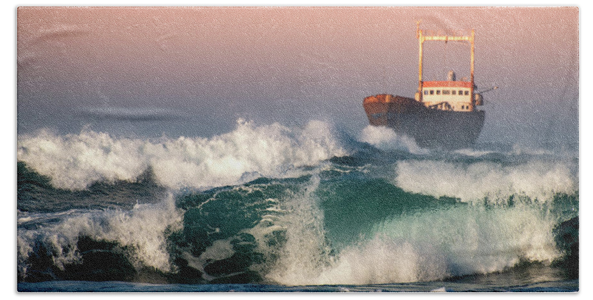Sea Bath Towel featuring the photograph Abandoned Ship and the stormy waves by Michalakis Ppalis