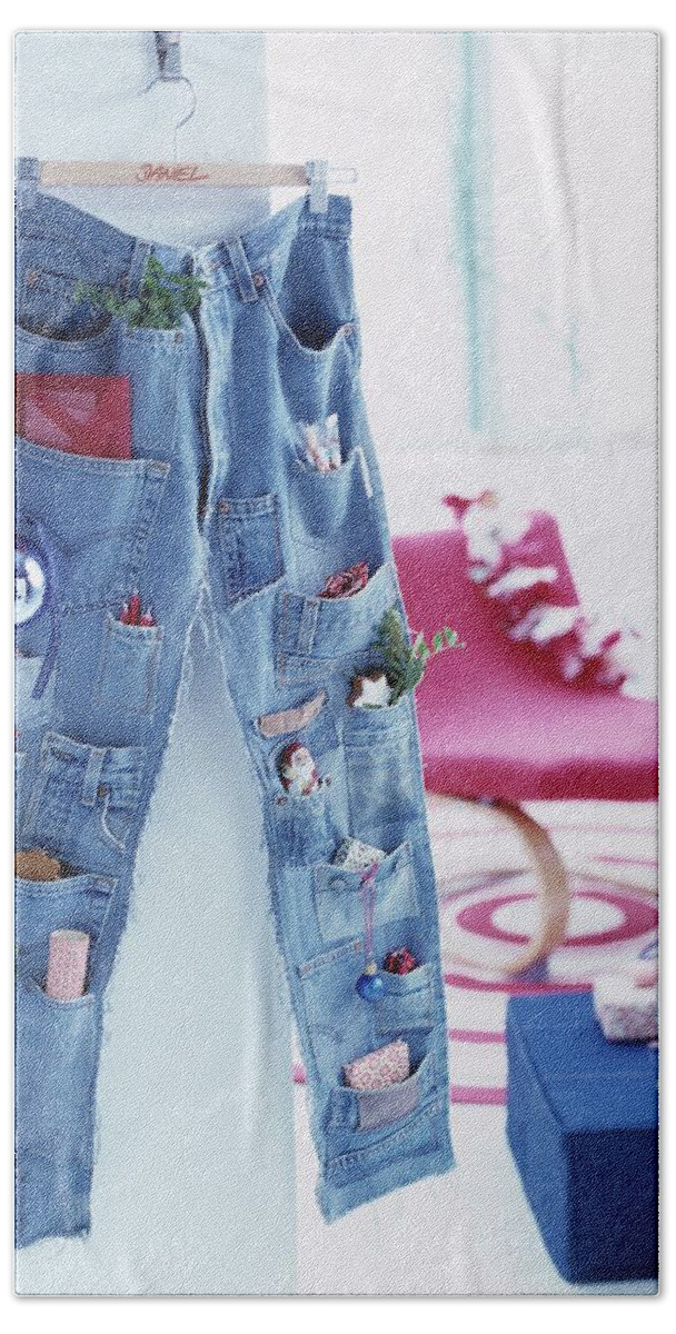 Ip_11514085 Hand Towel featuring the photograph Advent Calender Made From Pair Of Jeans With Pockets Sewn Onto Legs by Matteo Manduzio