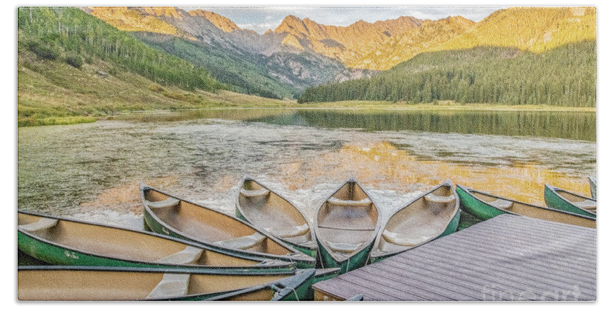 Canoe Hand Towel featuring the photograph Canoes at Sunset by Melissa Lipton
