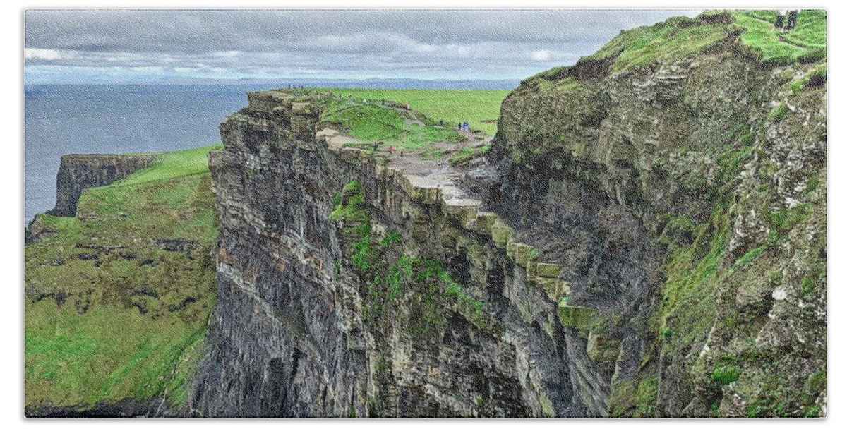 Cliffs Bath Towel featuring the photograph Cliff at Cliffs of Moher by Frozen in Time Fine Art Photography