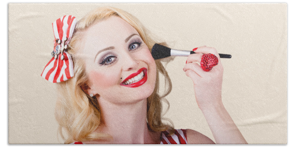 Beauty Bath Towel featuring the photograph Cosmetics pin-up model applying blusher makeup by Jorgo Photography