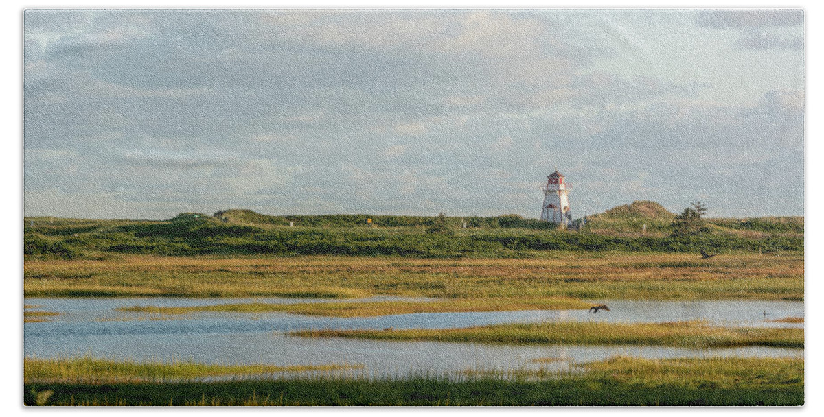 Stanhope Bath Towel featuring the photograph Cove Head Lighthouse across Wetlands by Douglas Wielfaert