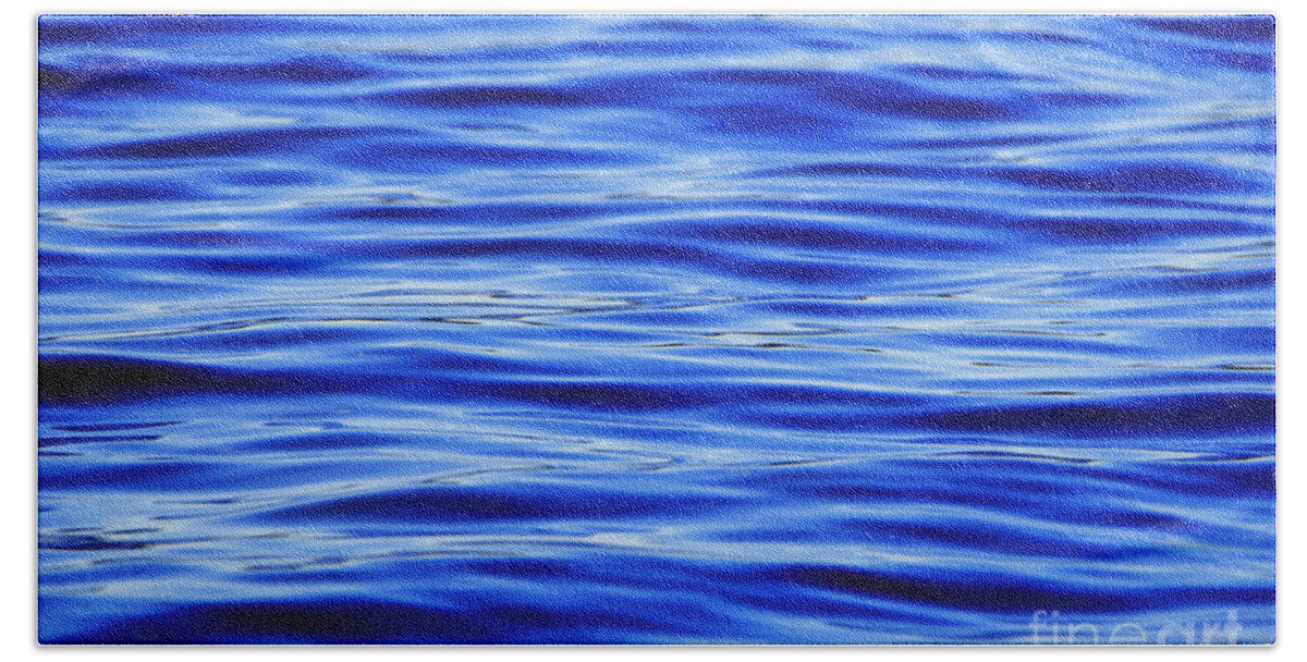 Blue Bath Towel featuring the photograph Dark Blue Water Ripples Background by Sandra J's