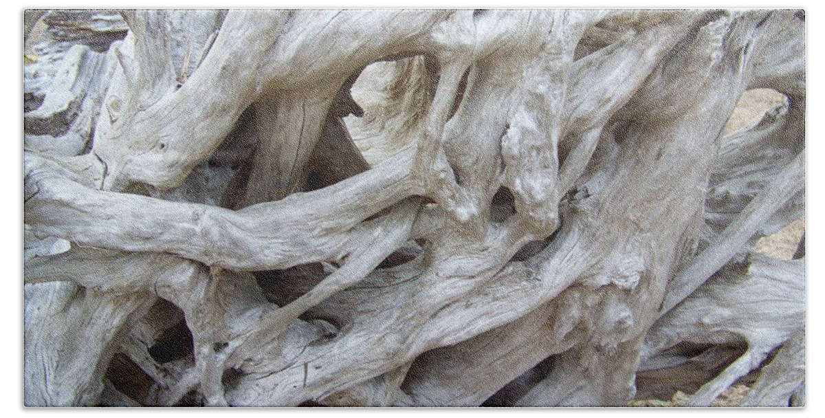 Driftwood Hand Towel featuring the photograph Driftwood by Julie Rauscher