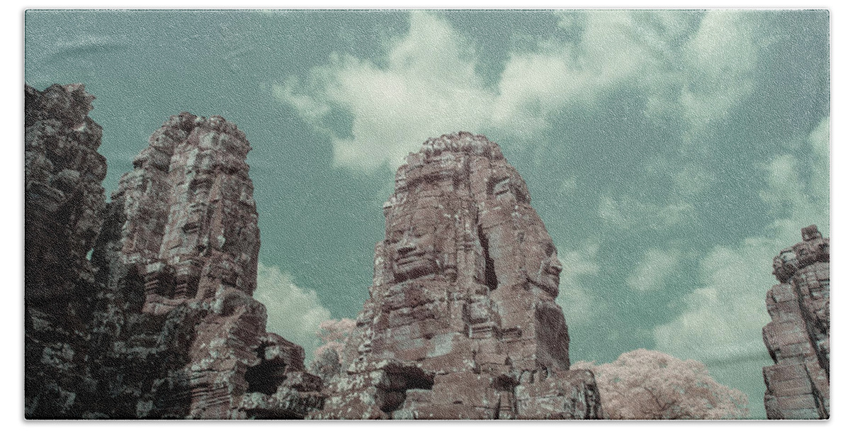 Ancient Bath Towel featuring the photograph Faces of Bayon Temple in infrared by Karen Foley