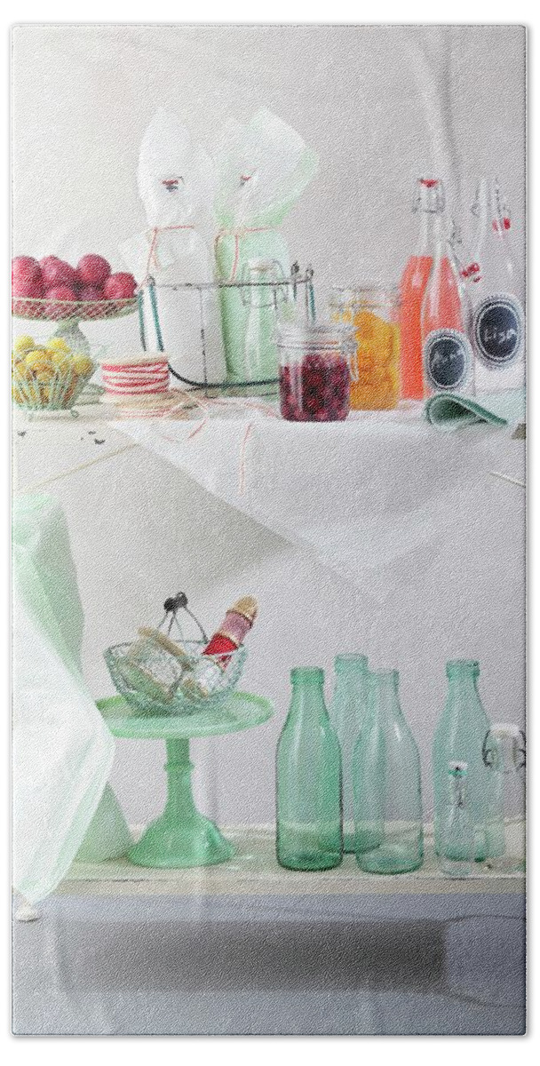 Ip_11962749 Hand Towel featuring the photograph Fresh Fruit And Jars Of Preserves On A Side Table by Peter Garten