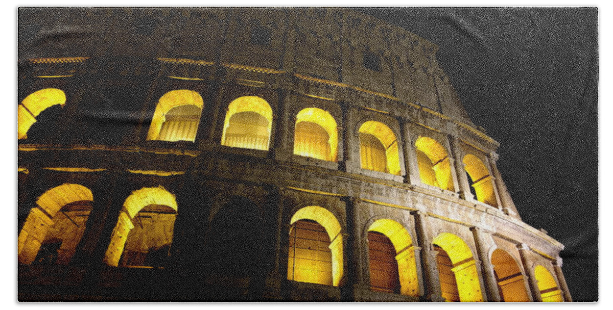 Colosseum At Night Hand Towel featuring the photograph Golden glow by Patricia Caron