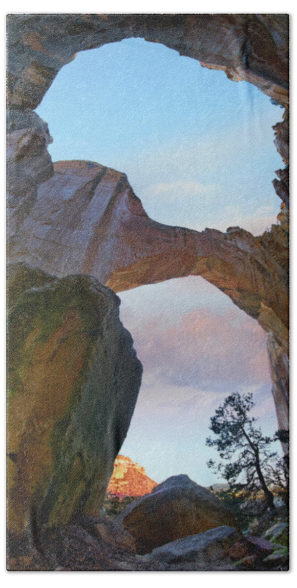 00559676 Bath Towel featuring the photograph La Ventana Arch Sunrise, El Malpais Nm, New Mexico by Tim Fitzharris
