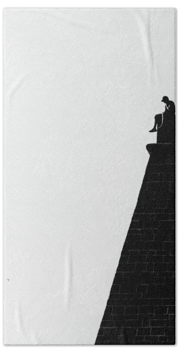 Man Bath Towel featuring the photograph Man on the Wall by Martin Vorel Minimalist Photography
