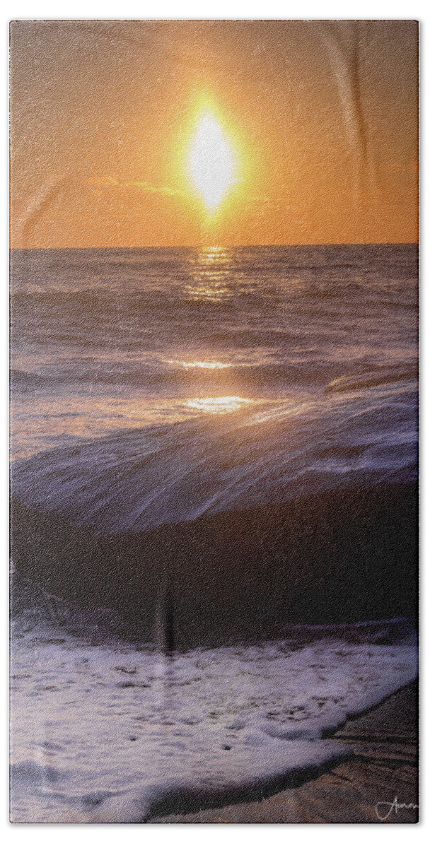 Beach Bath Towel featuring the photograph Orange Skies and Purple Rocks by Aaron Burrows