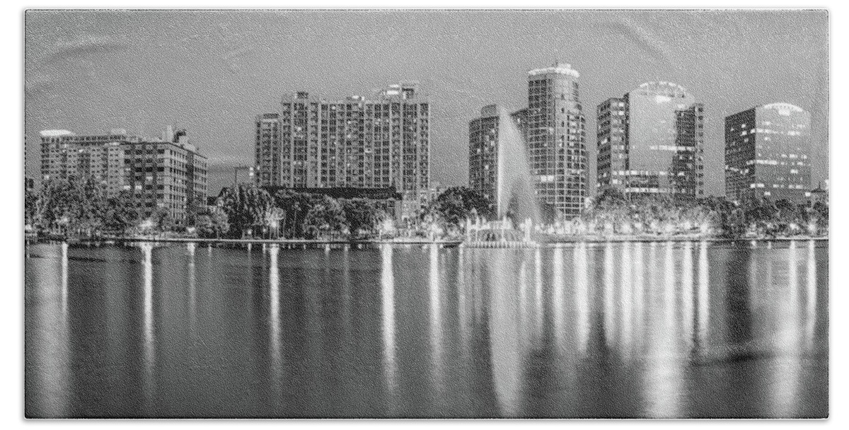 America Hand Towel featuring the photograph Orlando Skyline and Lake Eola Fountain at Dusk - Monochrome by Gregory Ballos
