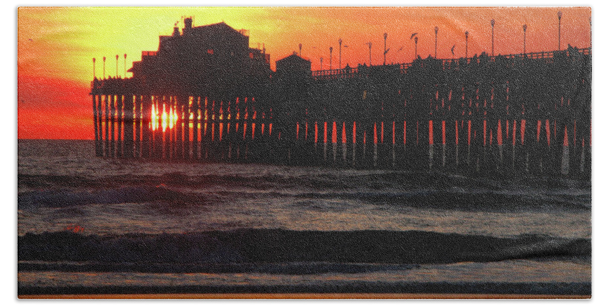 Pacific Ocean Bath Towel featuring the photograph Pier at Sunset by Terri Brewster