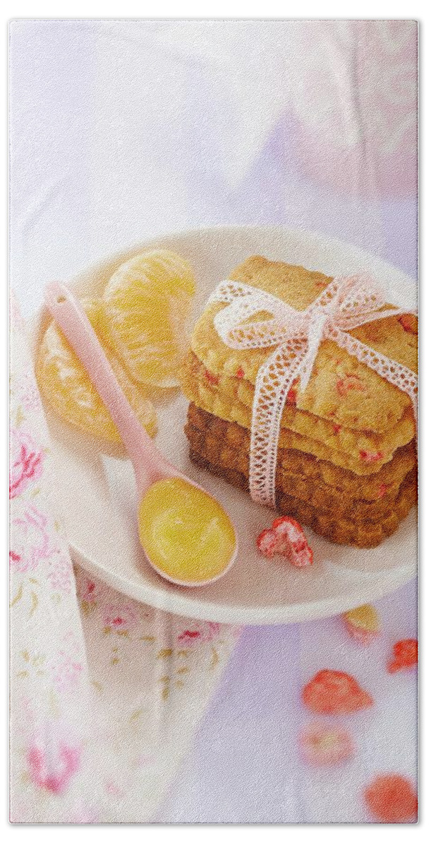 Ip_60314495 Hand Towel featuring the photograph Pink Praline Biscuits With Ugli Fruit Curd by Bru
