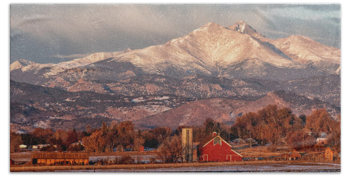 Farm Bath Towel featuring the photograph Rocky Mountains Tower Over a Farm by Tony Hake