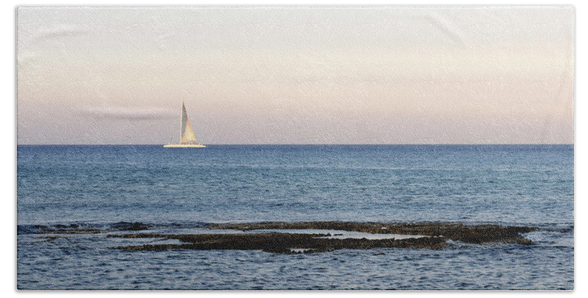 Sea Bath Towel featuring the photograph Sailing boat in the Calm Ocean by Michalakis Ppalis