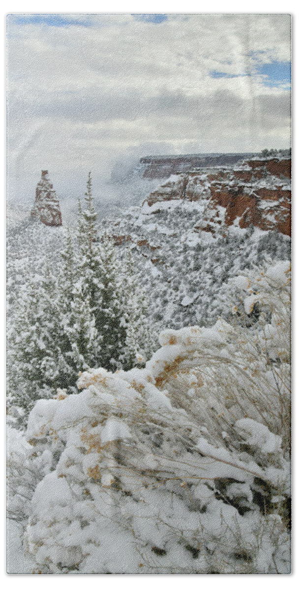 Colorado National Monument Bath Towel featuring the photograph Snowy Rim Rock Drive at Independence Monument Overlook by Ray Mathis