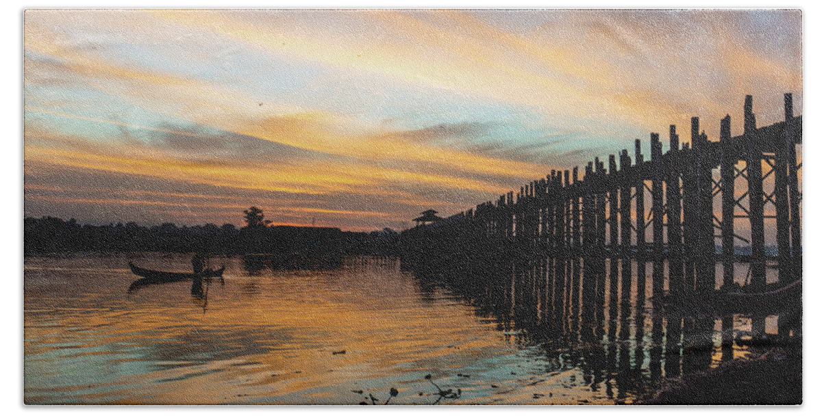 Fishing Hand Towel featuring the photograph sunrise at U Bein Bridge, Mandalay, Myanmar by Ann Moore