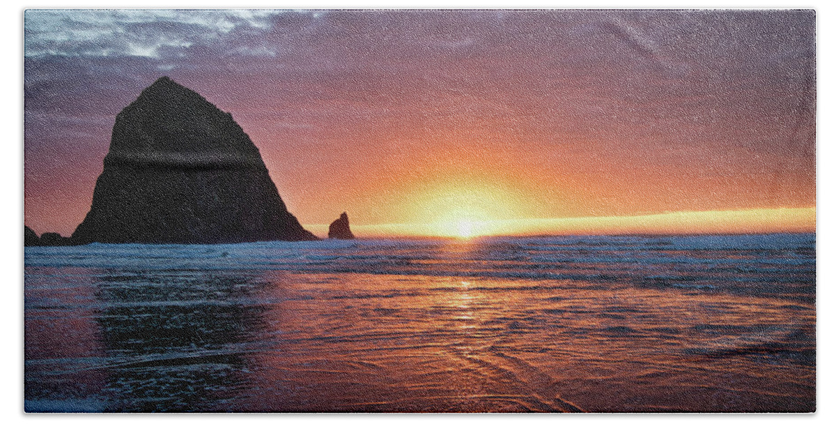 Sunset Hand Towel featuring the photograph Sunset at the Rock - Cannon Beach by Jeanette Mahoney