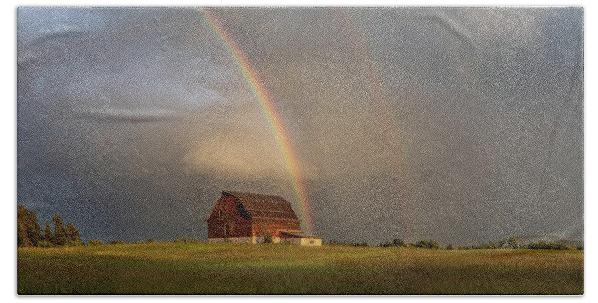 Abandoned Bath Towel featuring the photograph The Red Barn and a Rainbow by Jakub Sisak