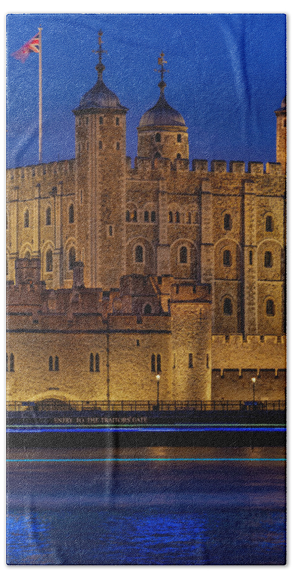 London Hand Towel featuring the photograph The Tower of London in England seen on a beautiful night. by George Afostovremea
