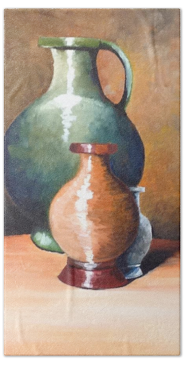 This Is A Still Life Of Three Ceramic Pitchers With Different Colors. The Two Large Pitchers Have A Reflective Surface. They Are Staged In The Corner Of A Small Counter. The Background Was Done With Many Different Colors To Portray A Old Wall Paper.  Hand Towel featuring the painting Three Pitchers by Martin Schmidt
