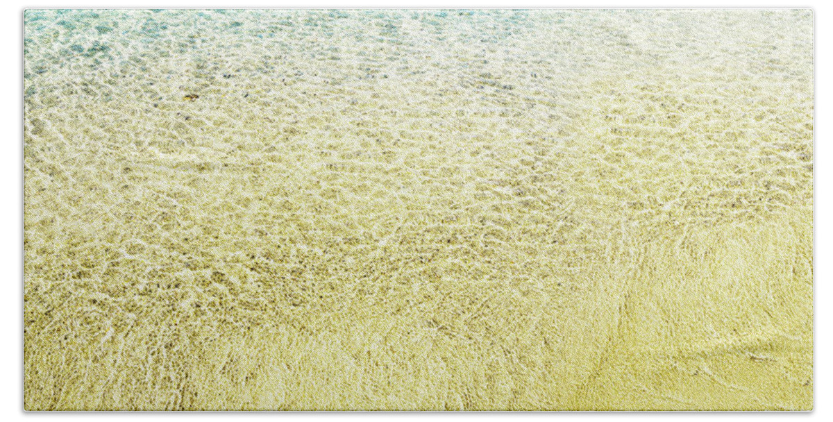 Sea Bath Towel featuring the photograph Top view of sea water and sand texture image. by Jelena Jovanovic