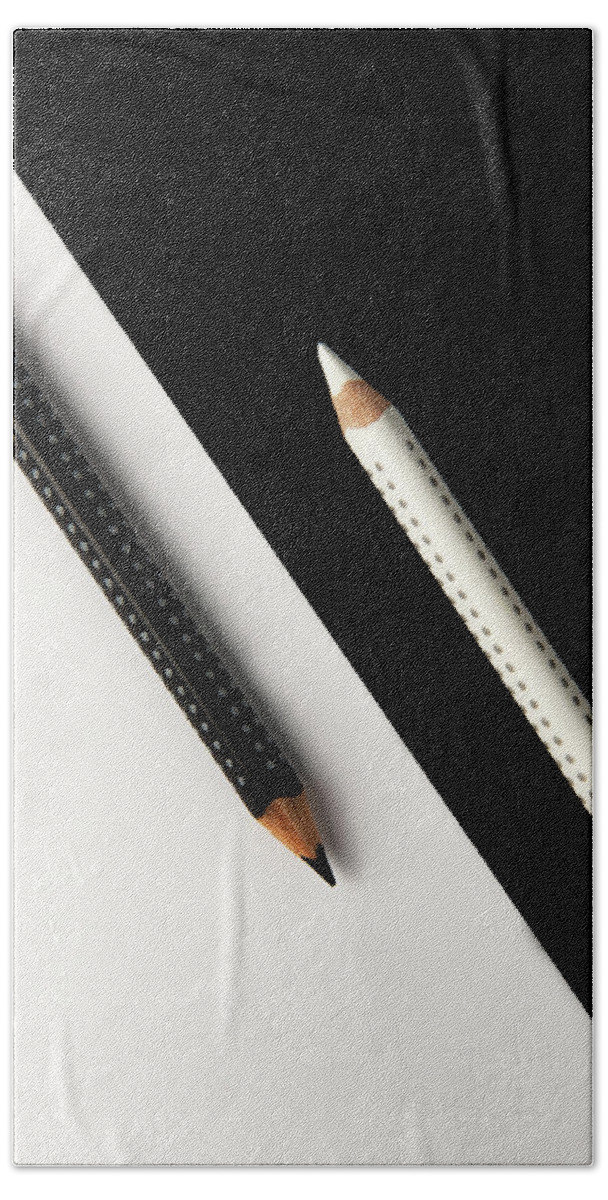 Pencil Bath Towel featuring the photograph Two drawing pencils on a black and white surface. by Michalakis Ppalis