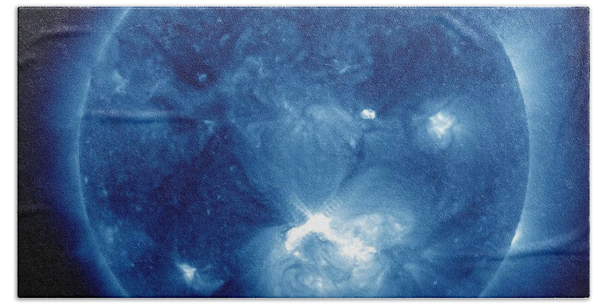 Light Bath Towel featuring the painting X1.4 Class Flare Released from Big Sunspot 1520 by Celestial Images