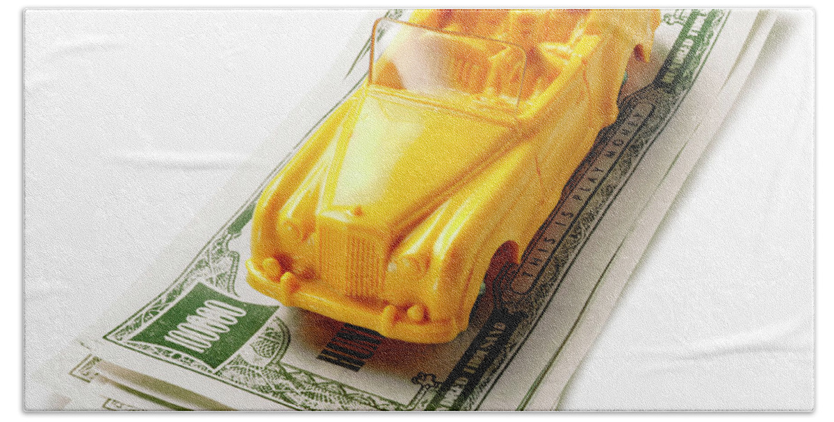 Abundance Hand Towel featuring the drawing Yellow Car on Stack of Money by CSA Images