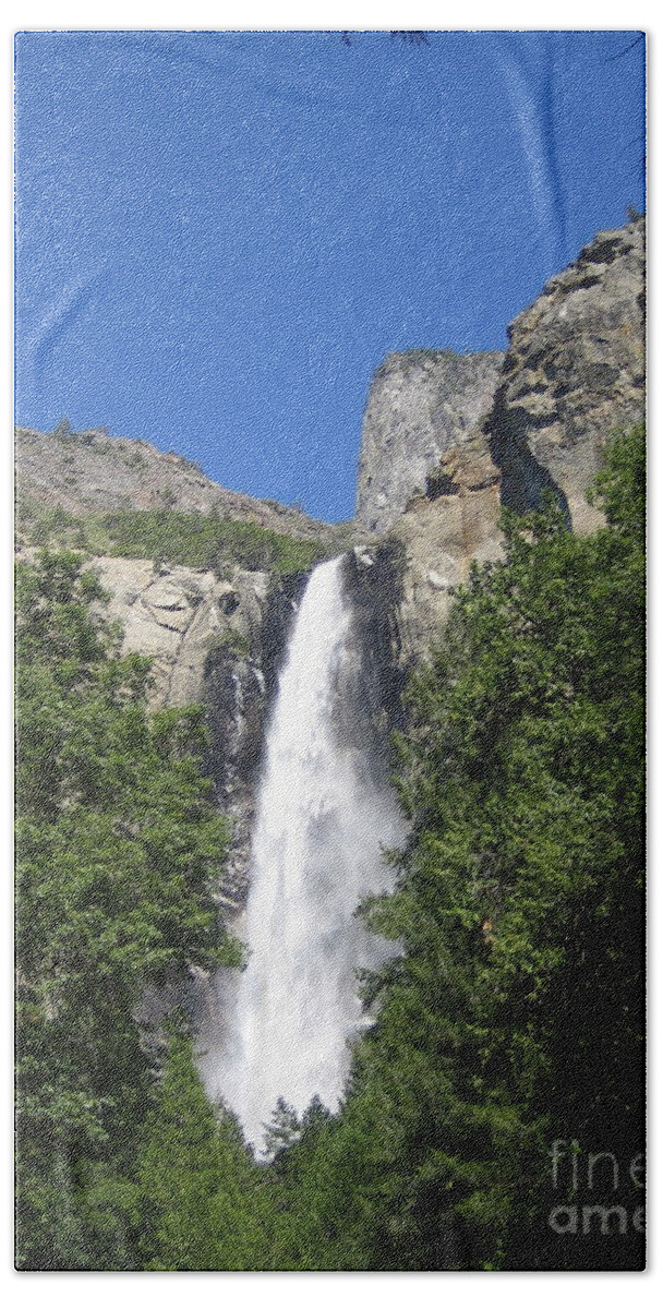 Yosemite Bath Towel featuring the photograph Yosemite National Park Bridal Veil Falls Water Fall Blast on a Blue Sky Day by John Shiron