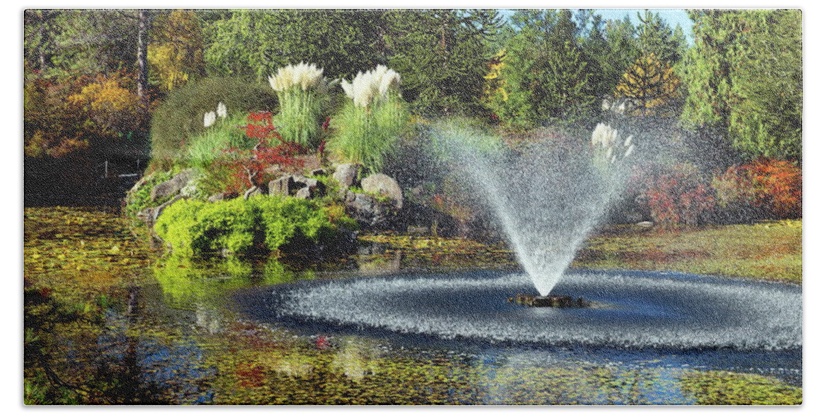 Alex Lyubar Bath Towel featuring the photograph Beautiful pond with fountain #1 by Alex Lyubar