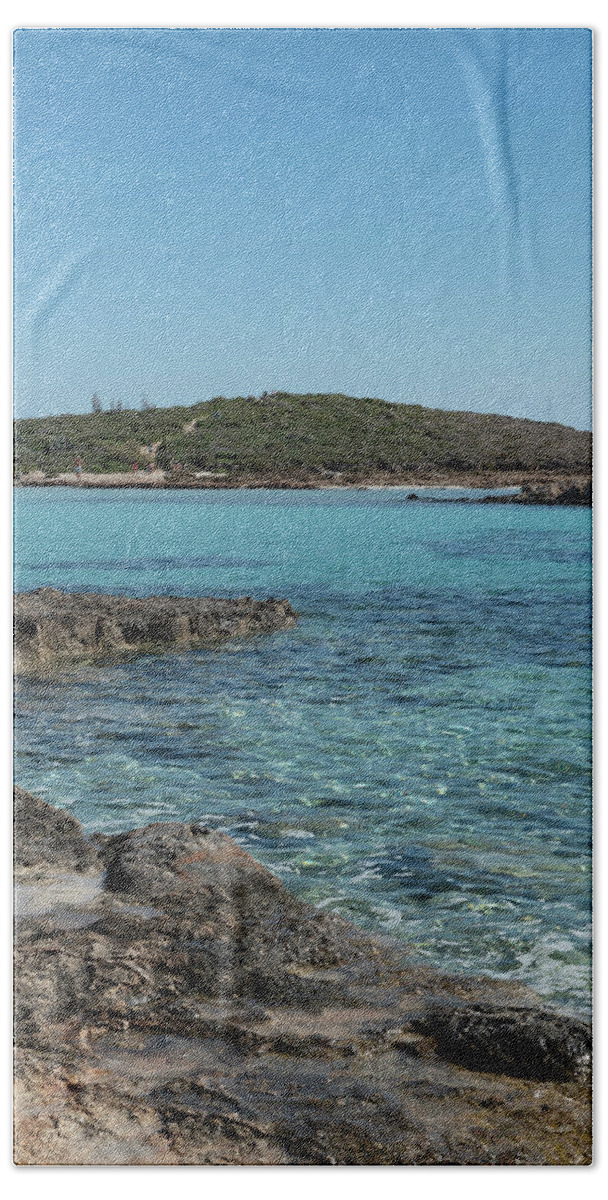 Agia Napa Bath Towel featuring the photograph Empty beach with blue water at Nissi beach ayia napa Cyprus. Famous tourist resort with clean water #2 by Michalakis Ppalis