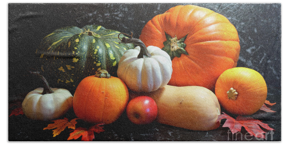 Pumpkin Bath Towel featuring the photograph Autumn harvest, diverse assortment of pumpkins on a black marble table counter. #4 by Milleflore Images