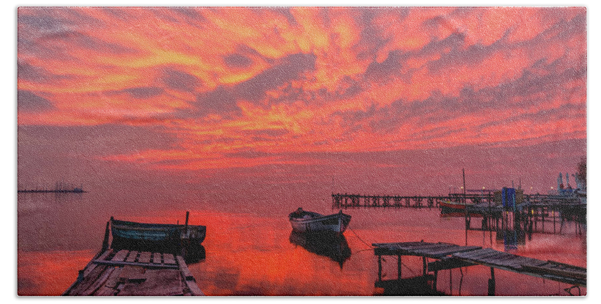 Pier Hand Towel featuring the photograph A burning sky over an old pier by Alexios Ntounas