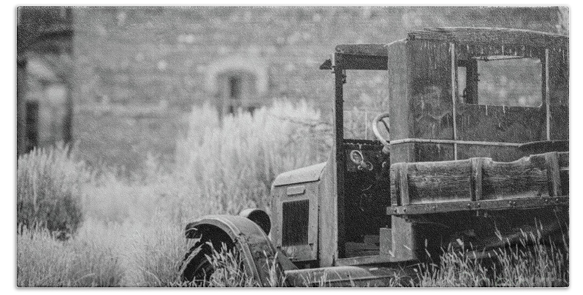 Ghost Bath Towel featuring the photograph Abandoned Ghost Town Truck Bannack Montana BW by Edward Fielding