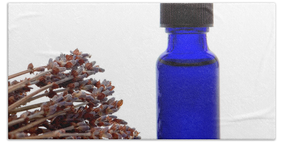 Aromatherapy Bath Towel featuring the photograph Aromatherapy Lavender Extract Essential Oil Bottle by Olivier Le Queinec
