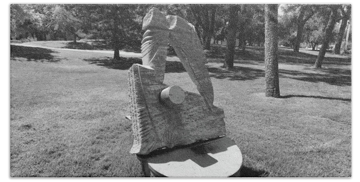 Albuquerque Bath Towel featuring the photograph Art statue on the campus of the University of New Mexico in black and white by Eldon McGraw