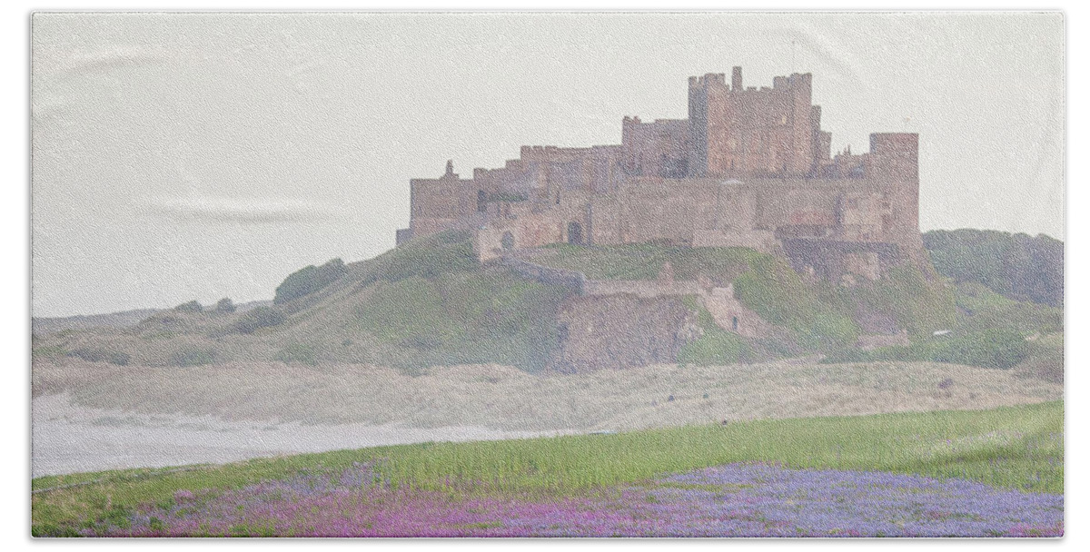 Bamburgh Castle Hand Towel featuring the photograph Bamburgh Castle with wild flower meadow by Anita Nicholson