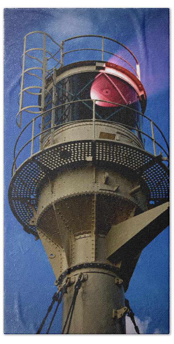 Lighthouse Bath Towel featuring the photograph Beam of light from a lighthouse. by Bernhard Schaffer