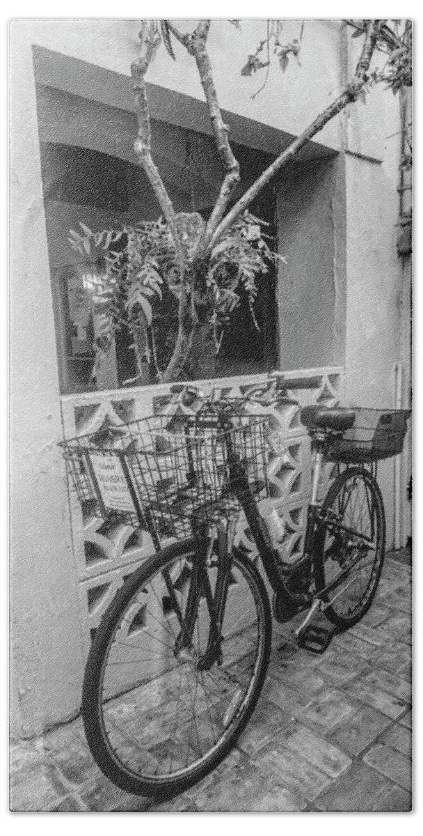 Worth Bath Towel featuring the photograph Bicycle in the Courtyard Black and White by Debra and Dave Vanderlaan