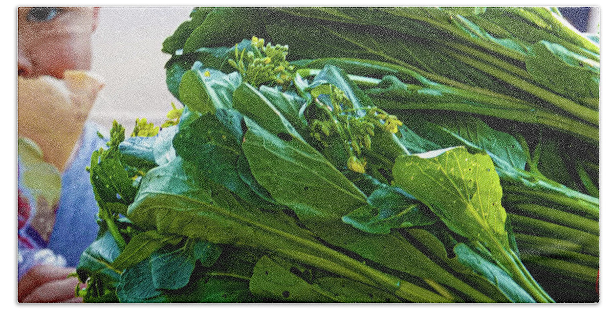 Botanical Bath Towel featuring the photograph Bright green vegetable leaves and small child eating by Jeremy Holton