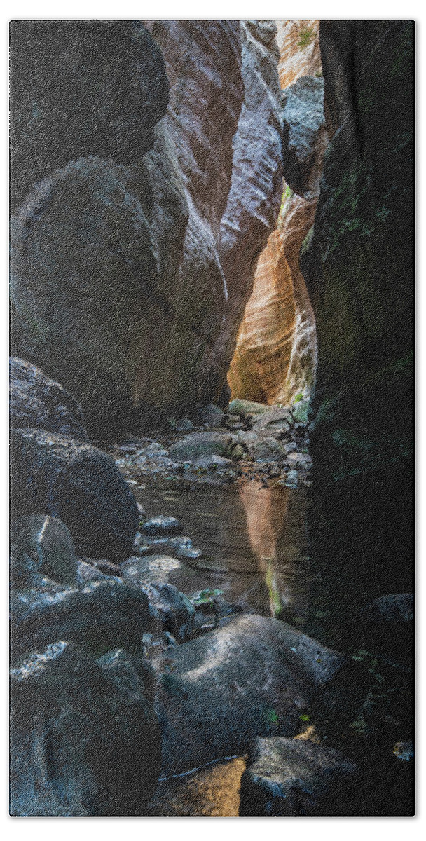 Canyon Bath Towel featuring the photograph Bright light through the rocks by Michalakis Ppalis