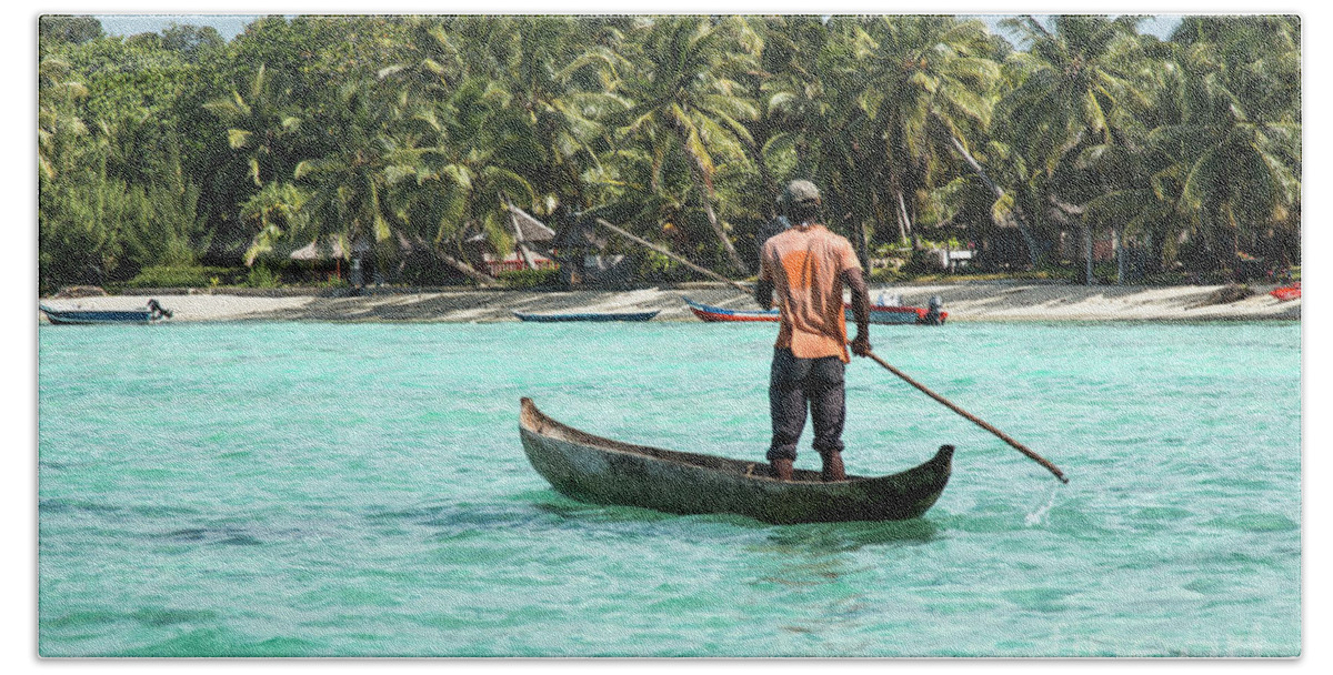 Madagascar Bath Towel featuring the photograph Canoe poling by a fisher by Claudio Maioli