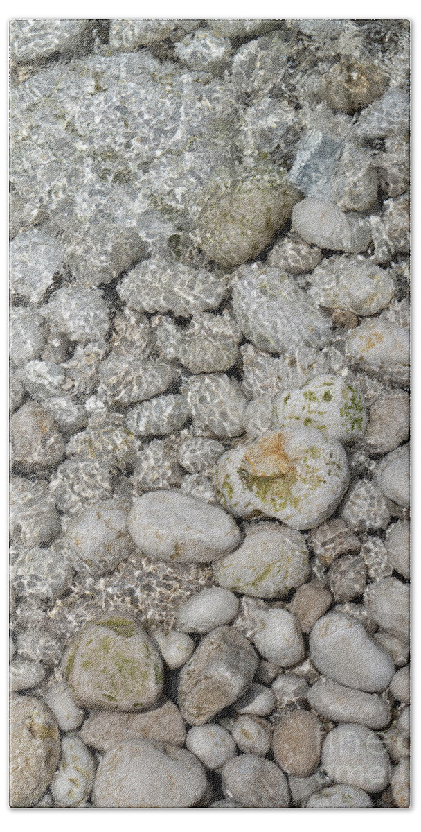 Coast Bath Towel featuring the photograph Clear sea water flowing over white stones 1 by Adriana Mueller
