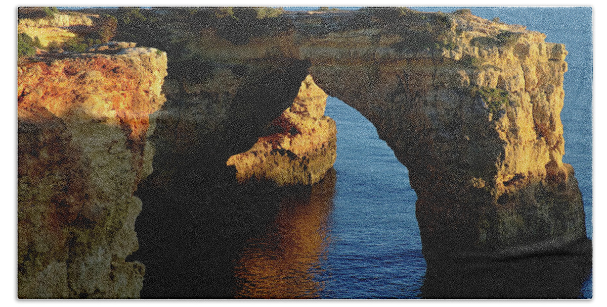 Algarve Bath Towel featuring the photograph Cliff Arch in Albandeira Beach during Sunset 2 by Angelo DeVal